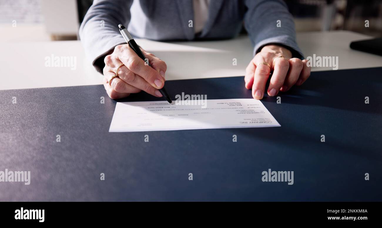 Image showcasing Payrol Compensation Bank Cheque. Cashing Money Check Stock Photo - Alamy
