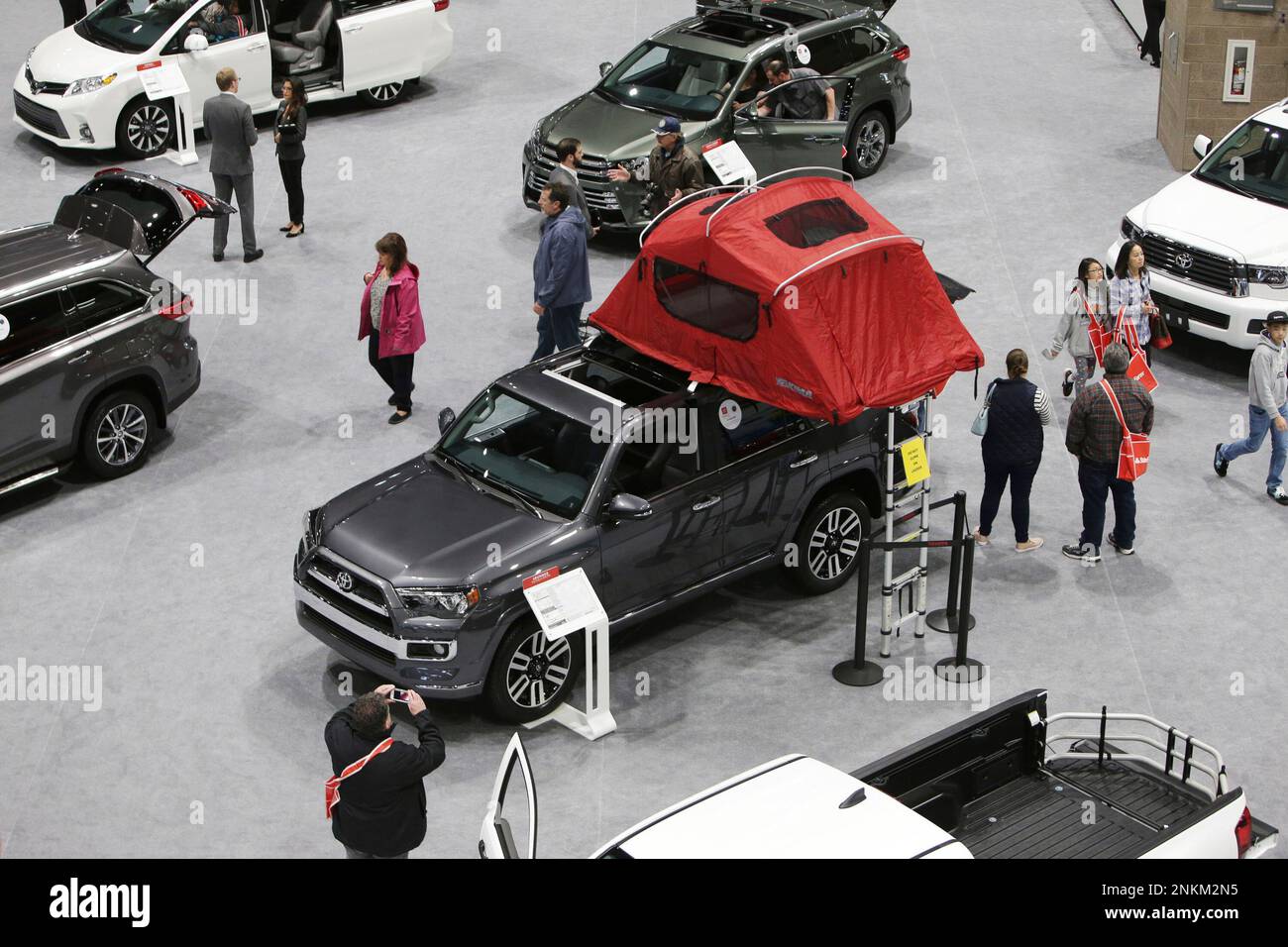 A new Toyota 4Runner has a tent attachment on the roof during the