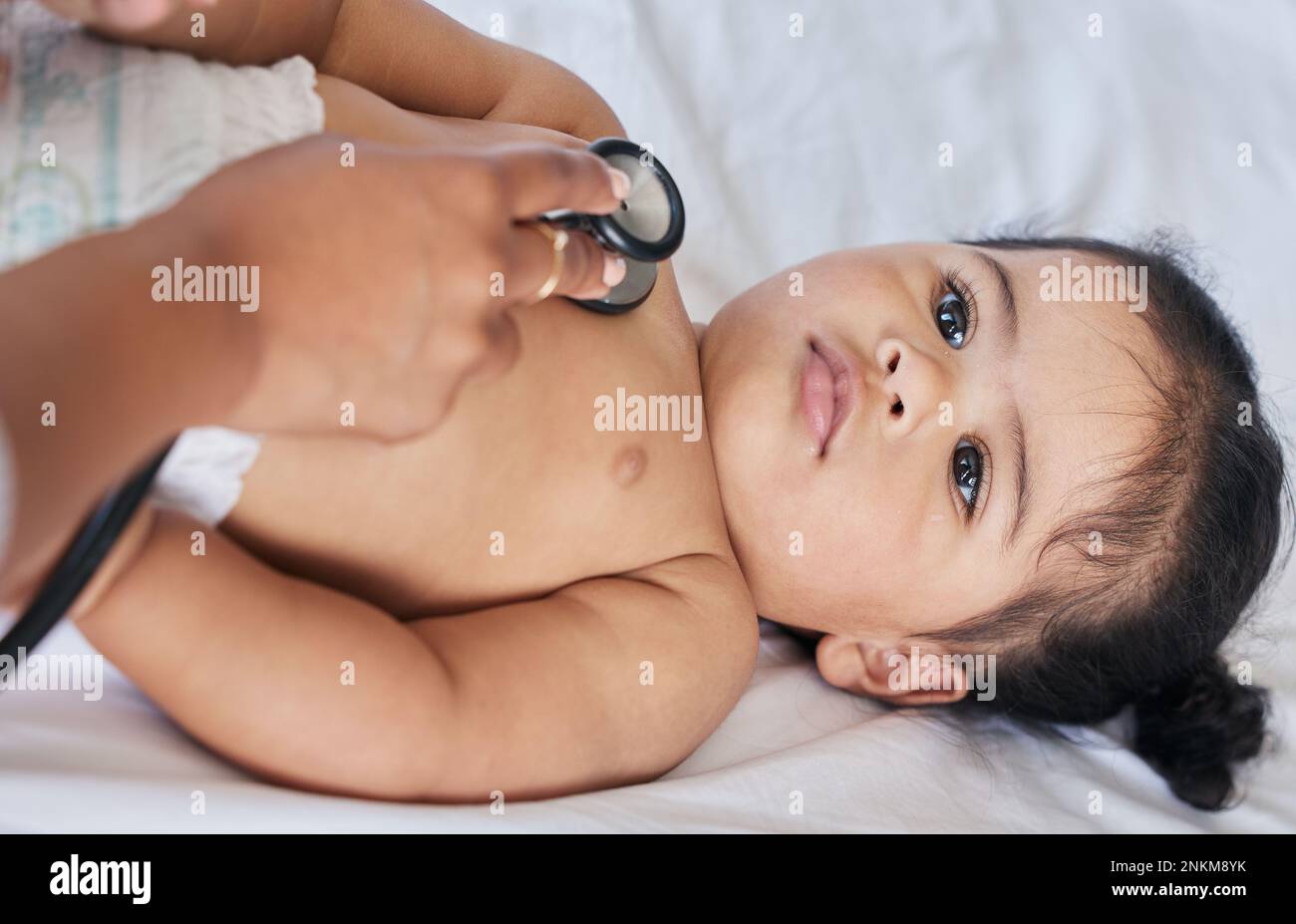 Babies checkup hi-res stock photography and images Page Alamy
