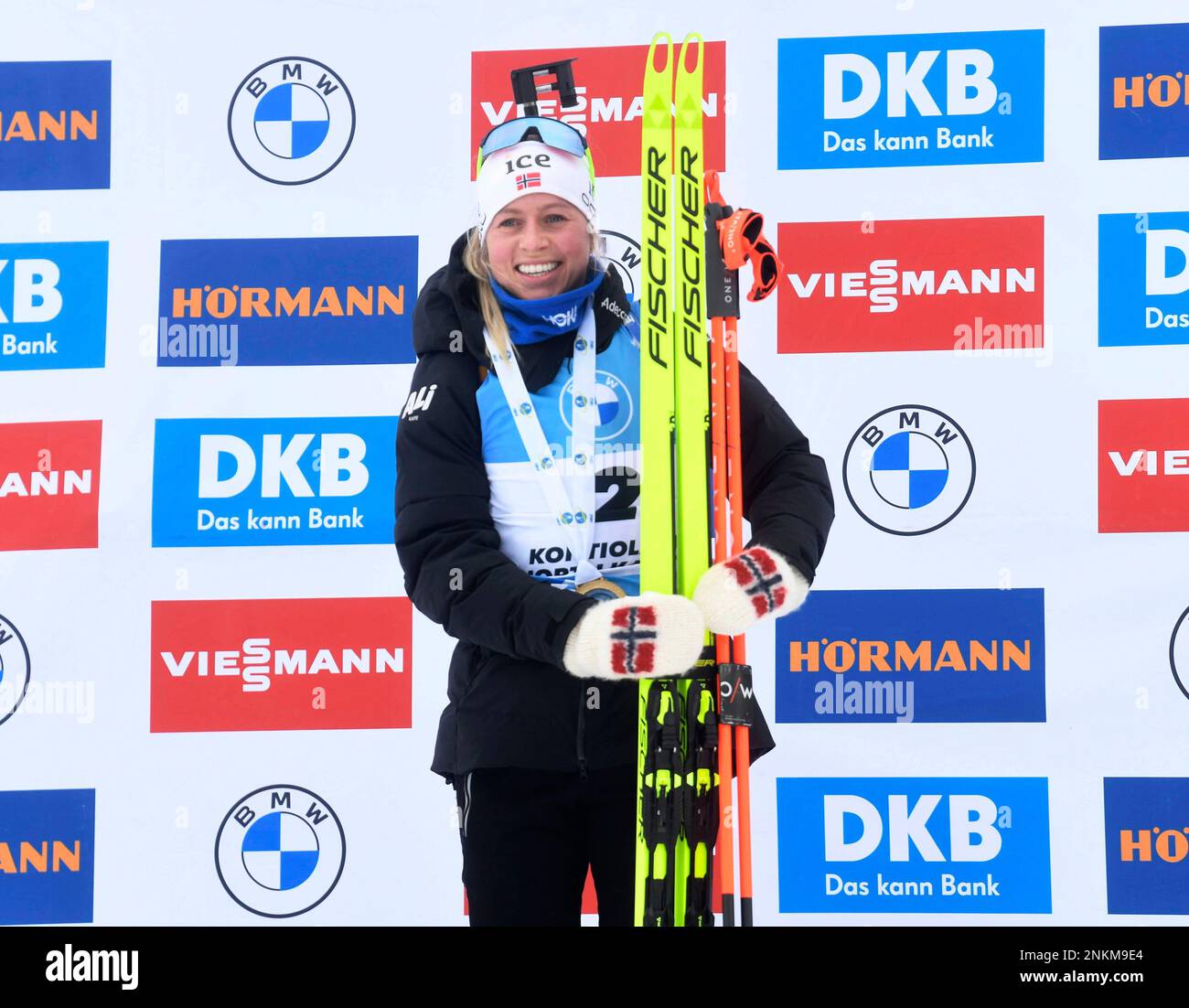 Winner Tiril Eckhoff of Norway celebrates on the podium after the Women ...