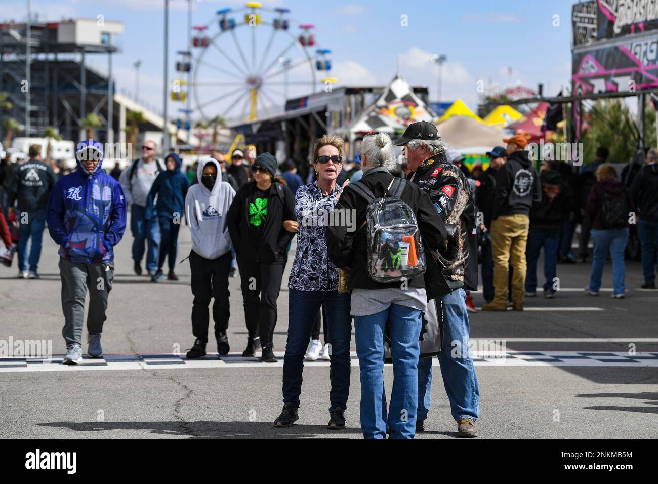 LAS VEGAS, NV - MARCH 05: Fans converse in the Fan Zone before the start of  the NASCAR Xfinity Series Alsco Uniforms 300 Saturday, March 5, 2022 at the  Las Vegas Motor