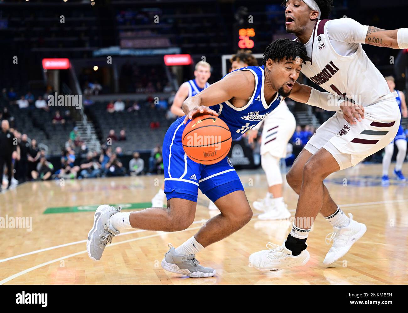 ST. LOUIS, MO - MARCH 05: Drake Bulldogs guard Okay Djamgouz (10) drives to  the basket in the first half during a college basketball game between the  Missouri State Bears and the