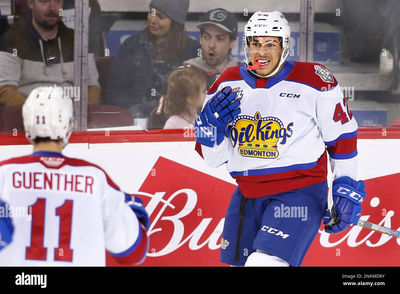 Edmonton Oil Kings player Justin Sourdif, rt, celebrates with Dylan Guenther his goal against the Calgary Hitmen during WHL (Western Hockey League) hockey action in Calgary, Alta., on Saturday, March 5, 2022