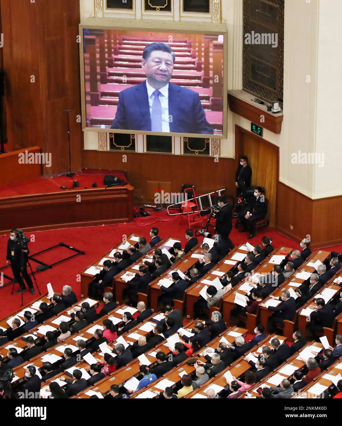 Xi Jinping, Chinese President, on a monitor delivers a speech during ...