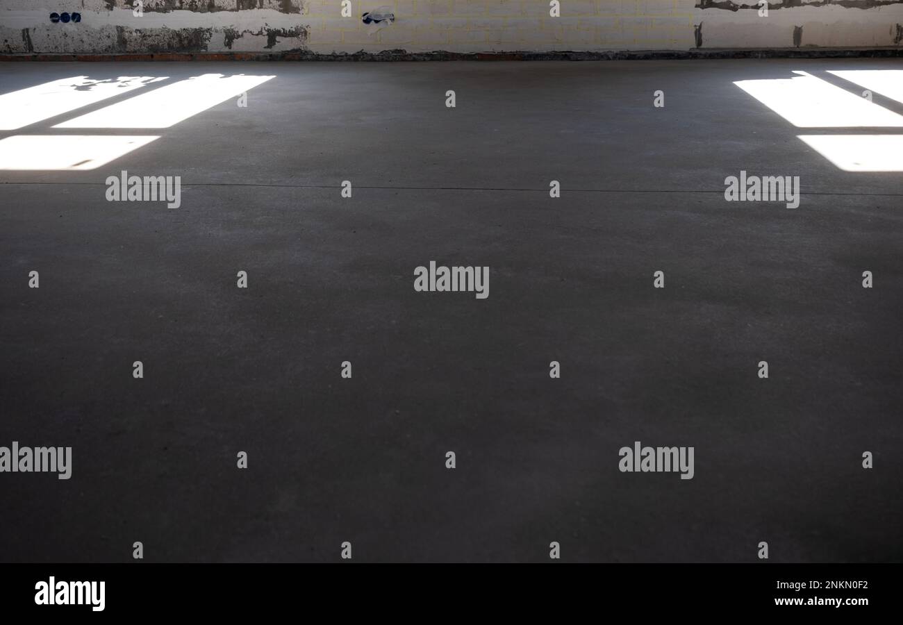 The leveled rough floor in a house under construction with a semidry