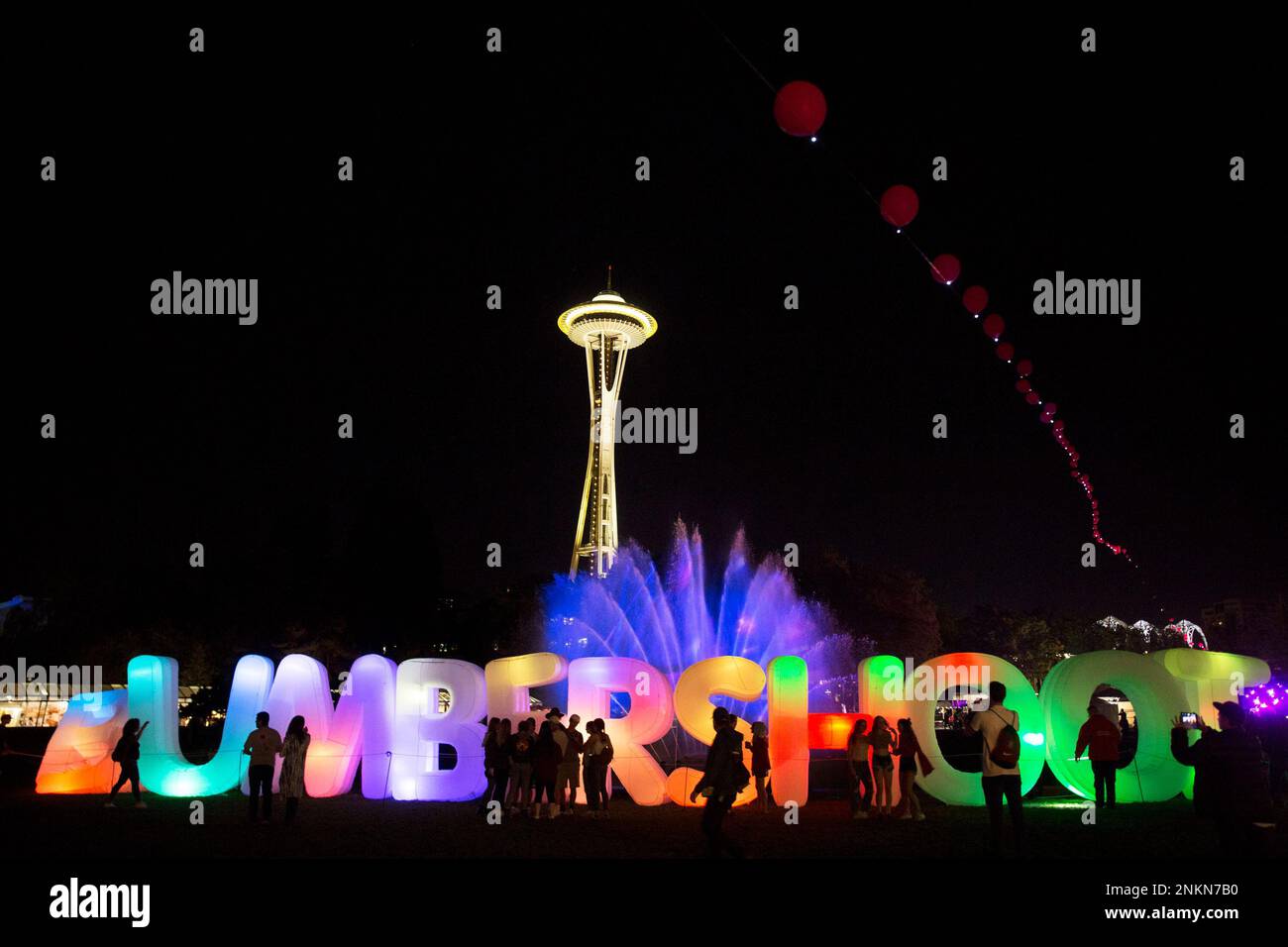 Inflated letters spelling Bumbershoot are illuminated on night two of
