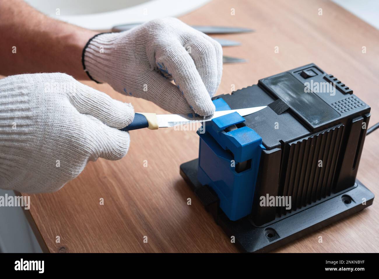 Electric knife sharpener hi-res stock photography and images - Alamy