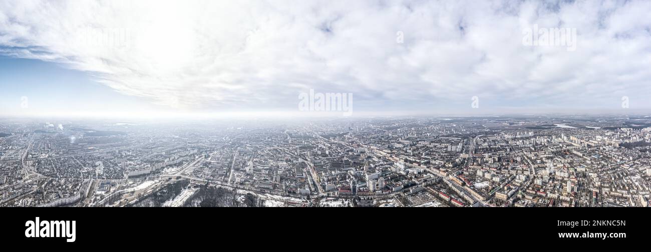 aerial winter cityscape in sunny day. winter scenery of big city from the bird eye. Stock Photo
