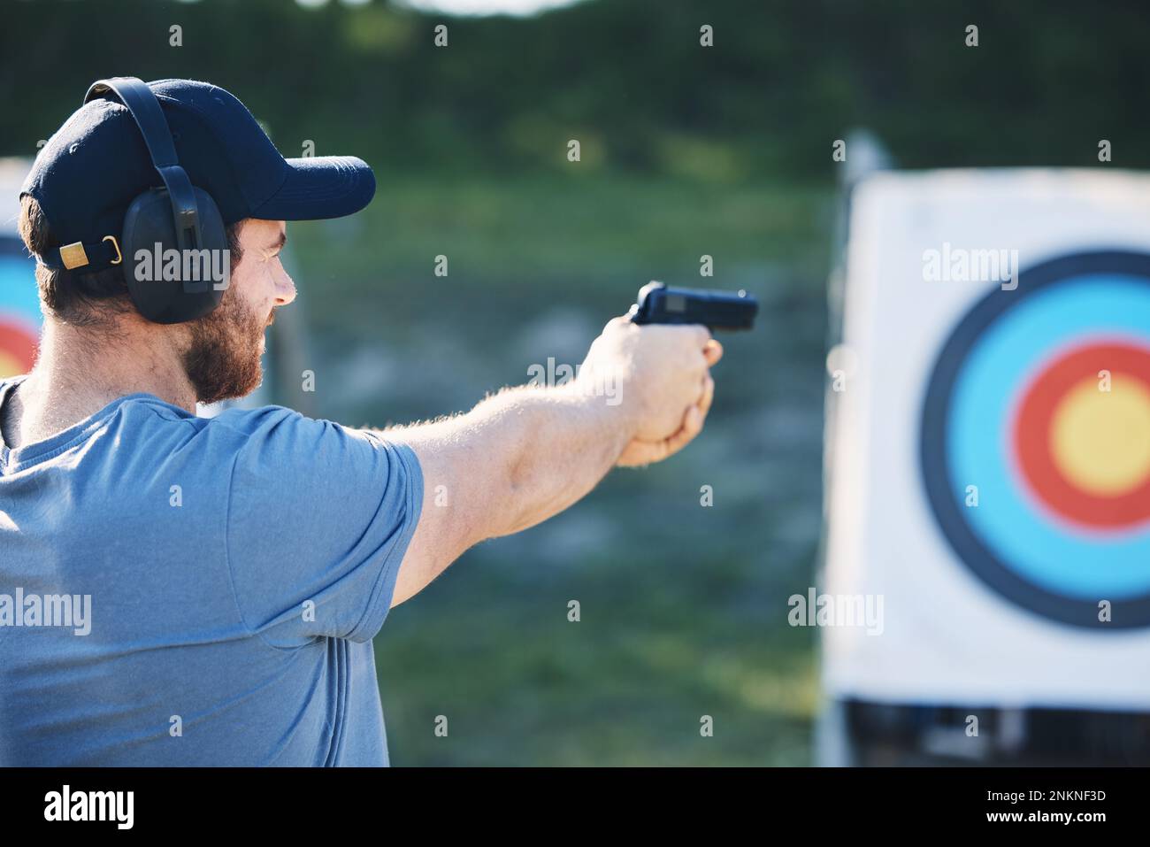 Man, firearm training and target for outdoor challenge, goals and aim