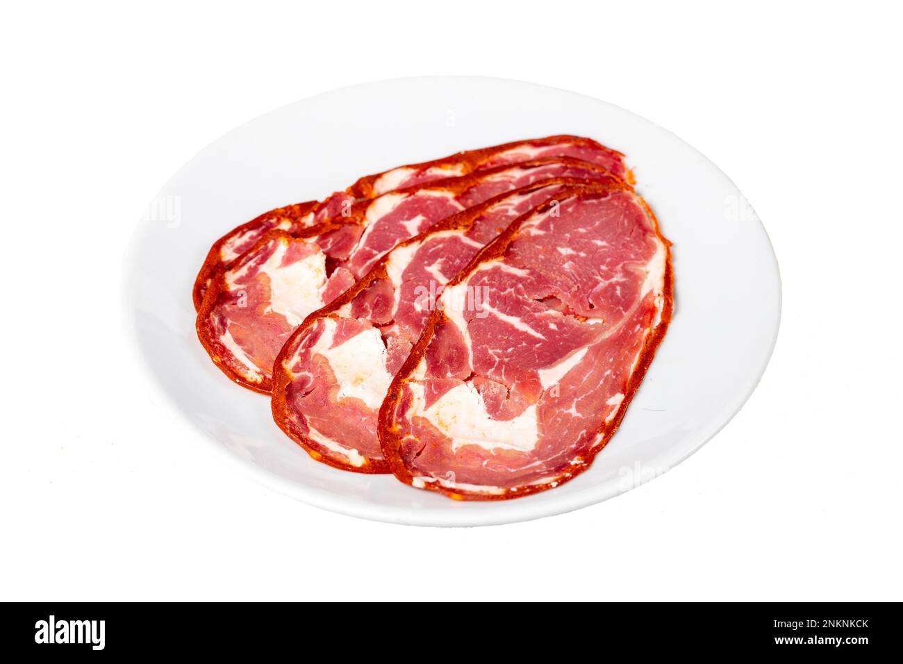 Beef ribeye pastrami isolated on white background. Dried Turkish bacon