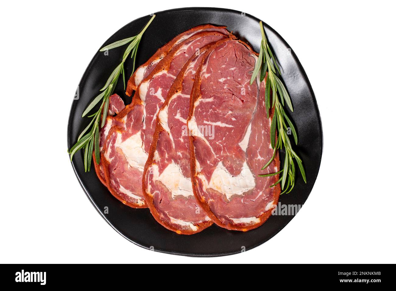 Beef ribeye pastrami isolated on white background. Dried Turkish bacon