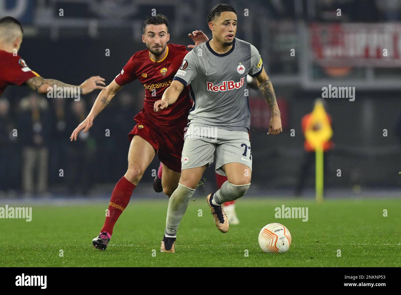 Rome, Italy. 23rd Feb, 2023. Noah Okafor of FC Salzburg and Bryan Cristante of A.S. Roma during the UEFA Europa League play-off second leg between A.S. Roma vs FC Salzburg on February 23, 2023 at the Stadio Olimpico in Rome, Italy. Credit: Independent Photo Agency/Alamy Live News Stock Photo