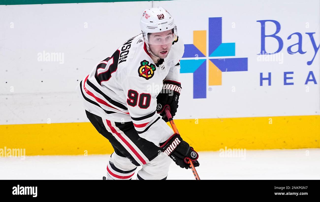 Chicago Blackhawks center Tyler Johnson controls the puck during an NHL