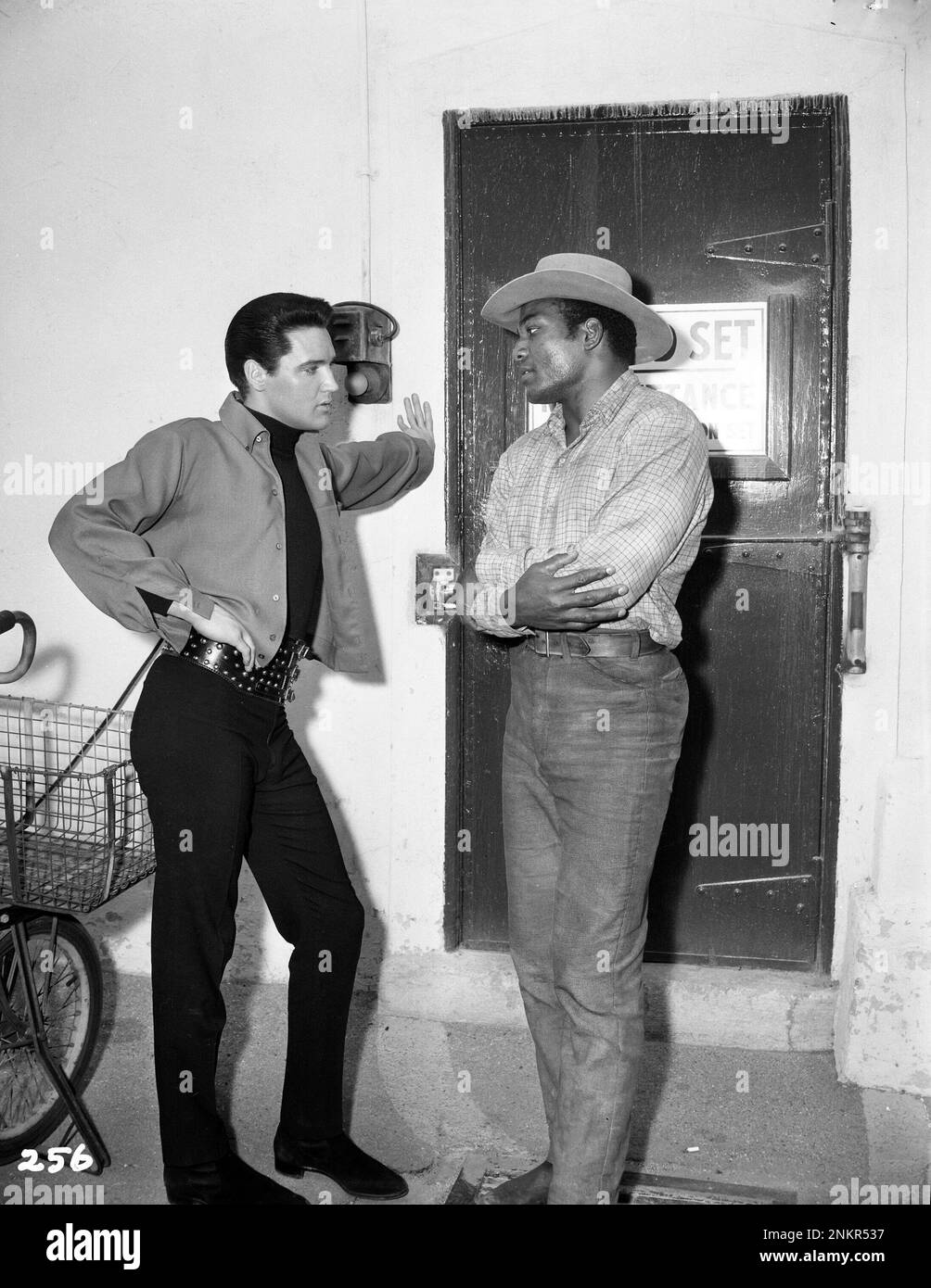 Elvis & Jim Brown while Elvis was filming "Roustabout" in 1964 Stock