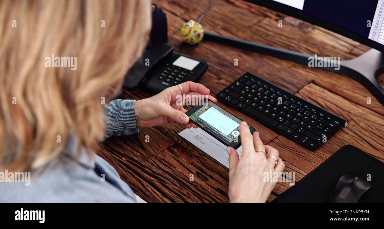 Remote Check Deposit Using Mobile Remote. Online Capture Stock Photo