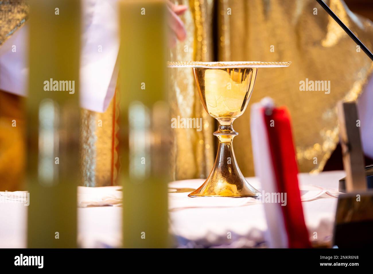 interiors and details in catholic church view of the altar, candles