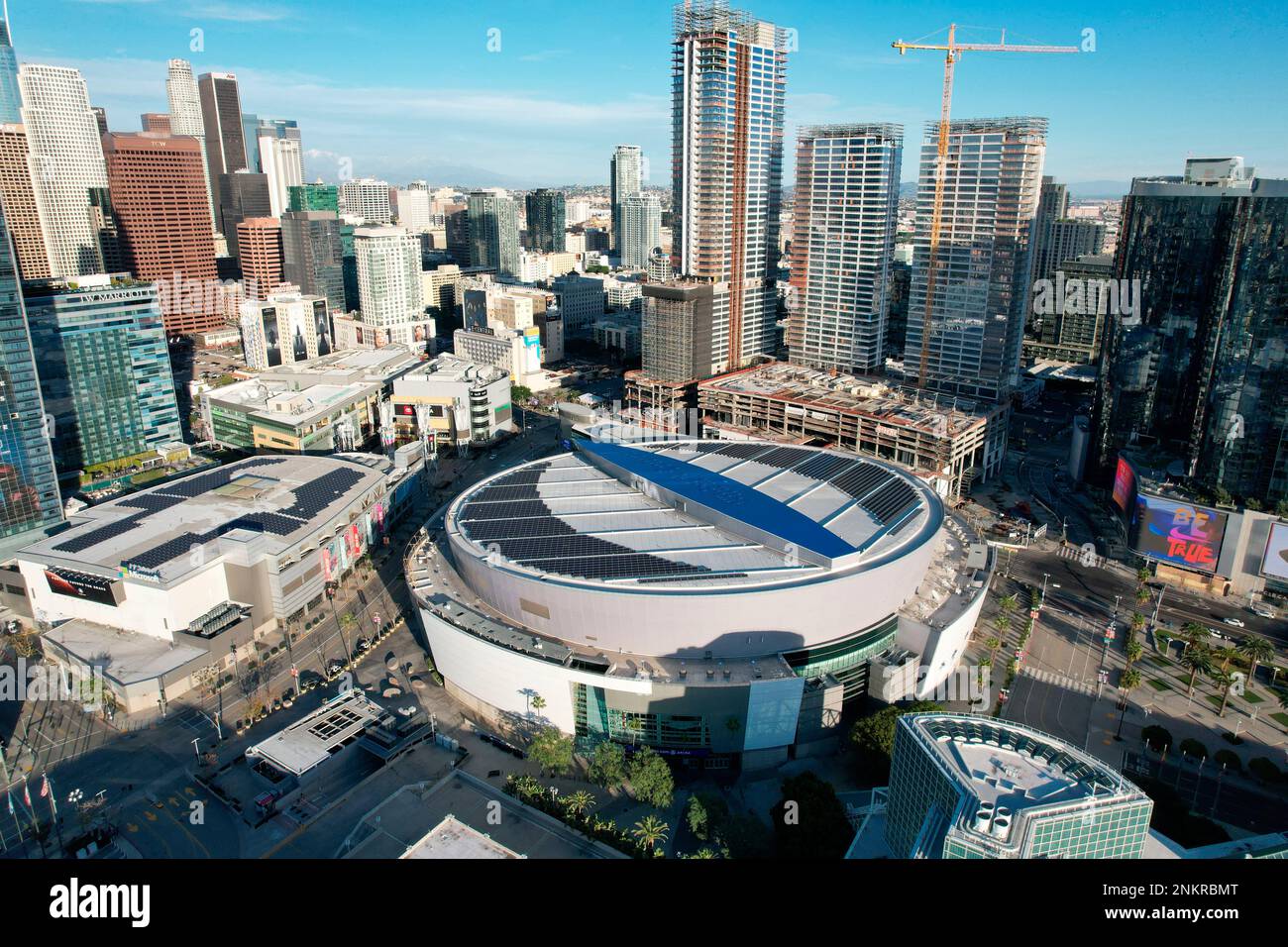 An aerial view of the Crypto.com Arena with the downtown skyline as a ...