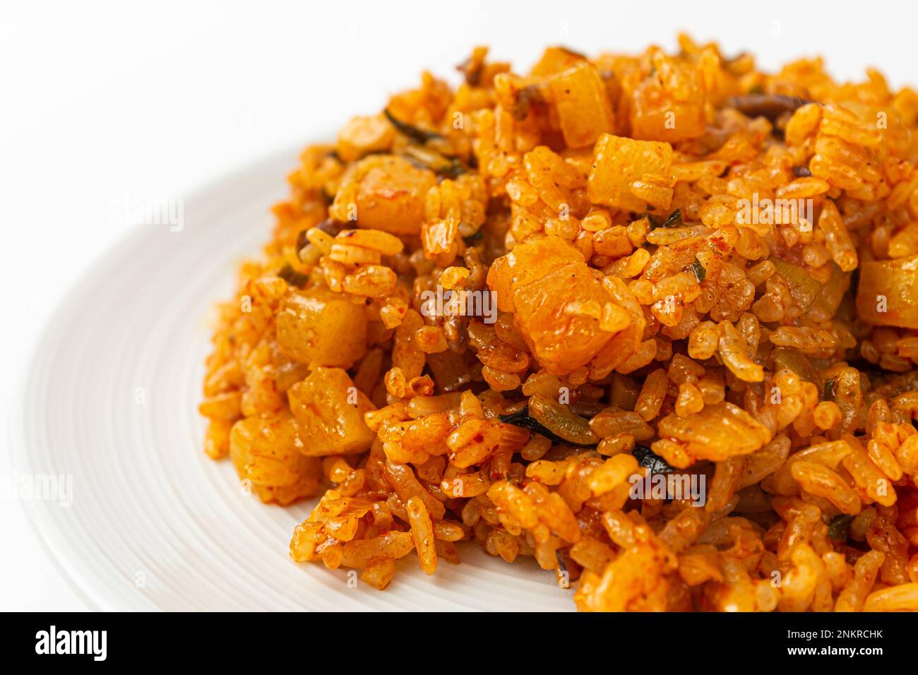 Food with radish kimchi. Stirfried rice and kimchi. Korean food