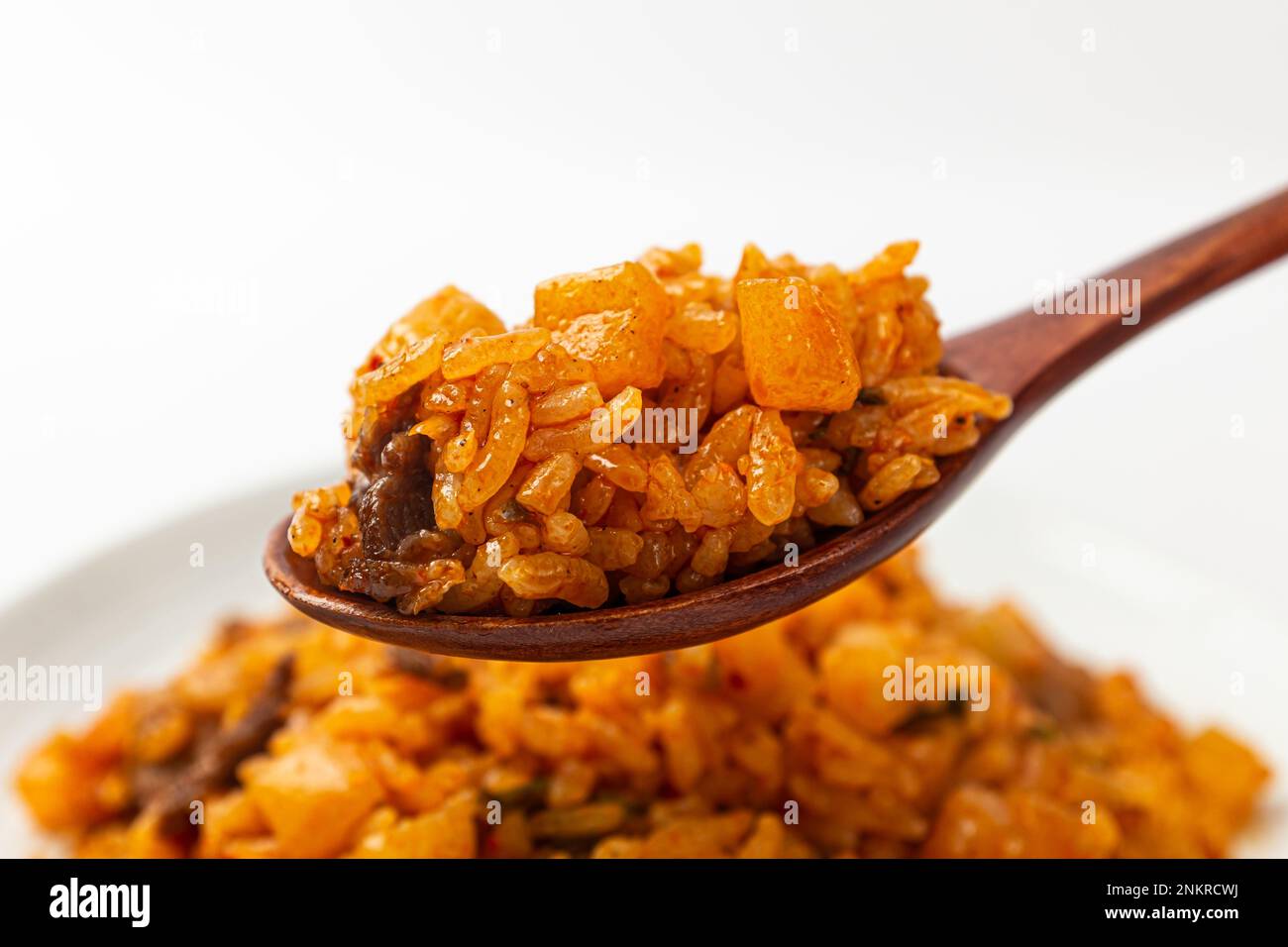 Food with radish kimchi. Stirfried rice and kimchi. Korean food