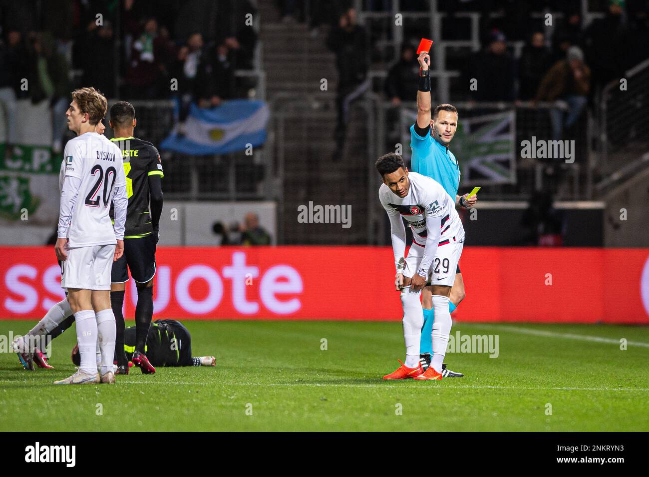 Herning, Denmark. 23rd Feb, 2023. Refereee Ivan Kruzliak hands out a red card to Paulinho (29) of FC Midtjylland during the UEFA Europa League match between FC Midtjylland and Sporting CP at MCH Arena in Herning. (Photo Credit: Gonzales Photo/Alamy Live News Stock Photo
