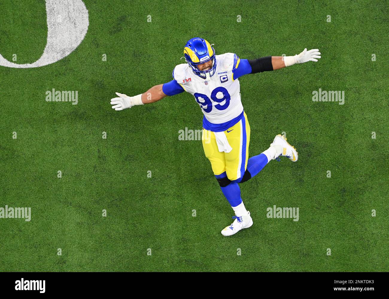 Los Angeles Rams defensive lineman Aaron Donald explodes through a double  team to sack quarterback Joe Burrow