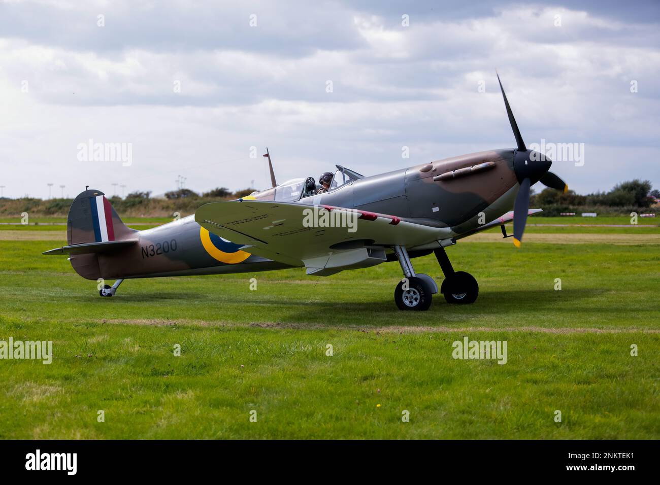 This is the Supermarine Spitfire Ia P9374 which served wtith the RAF during the Battle of Britain. The display was at Shoreham Airshow, Shoreham Airport, East Sussex, UK. 30th August 2014 Stock Photo