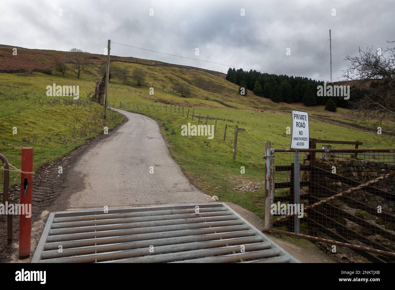 Approach road to the Bilsdale Transmitting Station on the North York Moors and the new mast erected since the fire in 2021, North Yorkshire, England Stock Photo