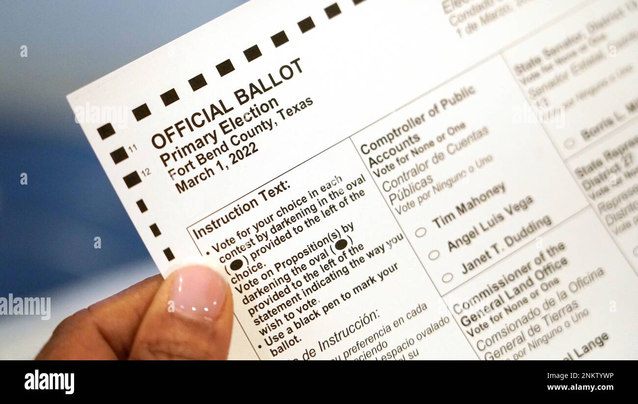 FILE -Pam Gaskin talks about her mail-in primary election ballot at her home Monday, Jan. 31, 2022, in Missouri City, Texas. A federal judge has handed Texas’ elections overhaul a partial defeat days ahead of 2022′s first primary. The ruling Friday night, Feb. 11, 2022 by U.S. District Judge Xavier Rodriguez in San Antonio weakens new rules that make it a crime for election officials to proactively help voters get a ballot by mail. It orders Texas not to enforce that narrow part of the law against Harris County, which in 2020 sought to send more than 2 million Houston voters mail-in ballot app Stock Photo