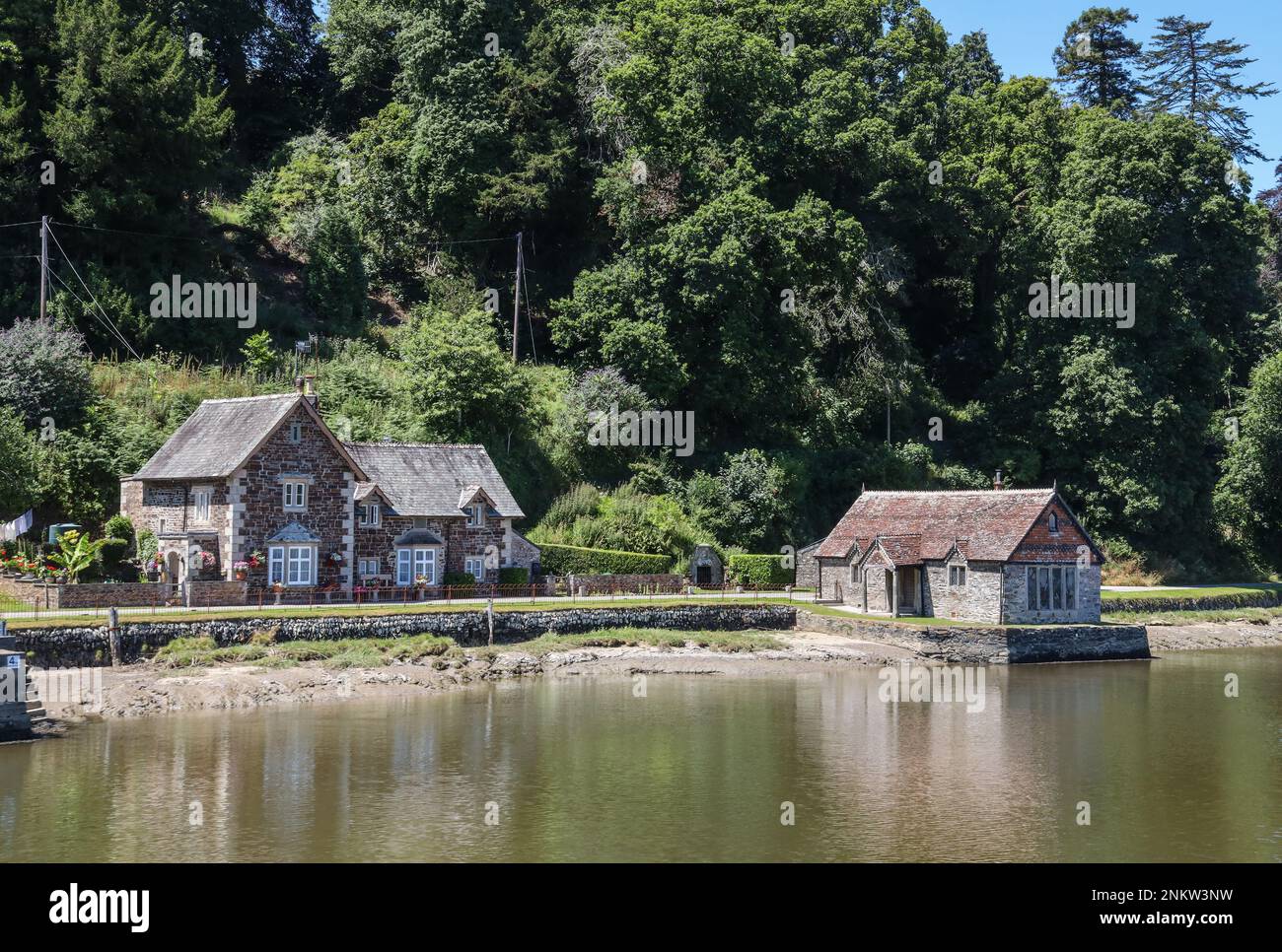 The Quay and bathing house at Pentille Castle set in woodlands, on the Cornish banks of the River Tamar. Taken on a cruise up the River Tamar from Ply Stock Photo