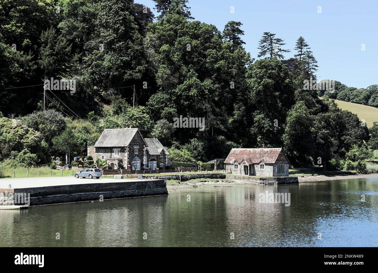 Photo illustration   The Quay and bathing house at Pentille Castle set in woodlands, on the Cornish banks of the River Tamar. Taken on a cruise up the Stock Photo