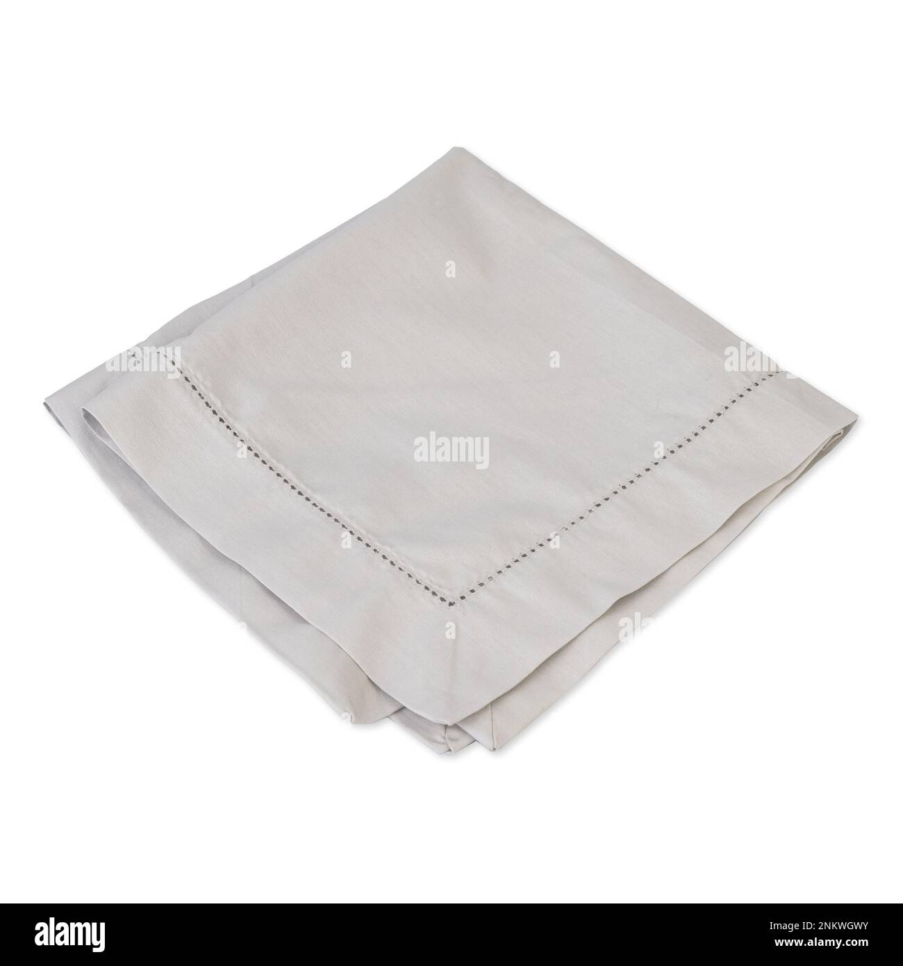 Folded grey tissue napkin isolated over white background. Stock Photo