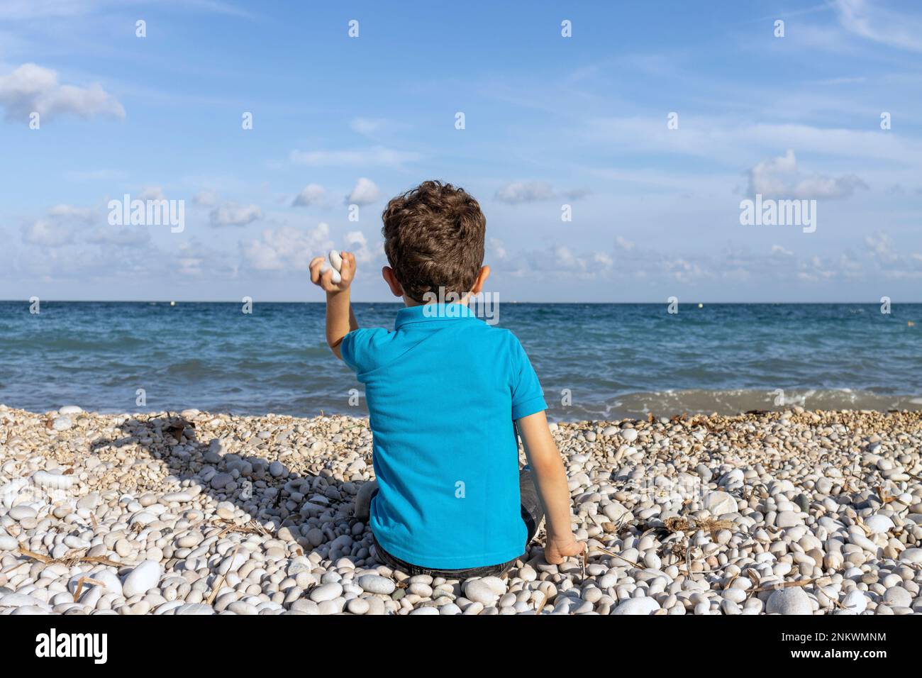 Feeling the ocean breeze and the excitement of throwing stones into the