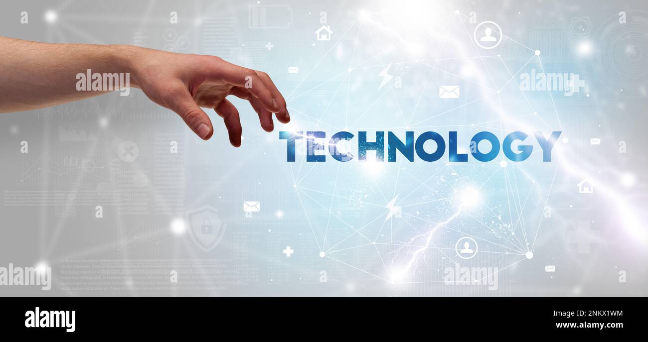 Inscription Technology Hand pointing at inscription concept Stock Photo - Alamy