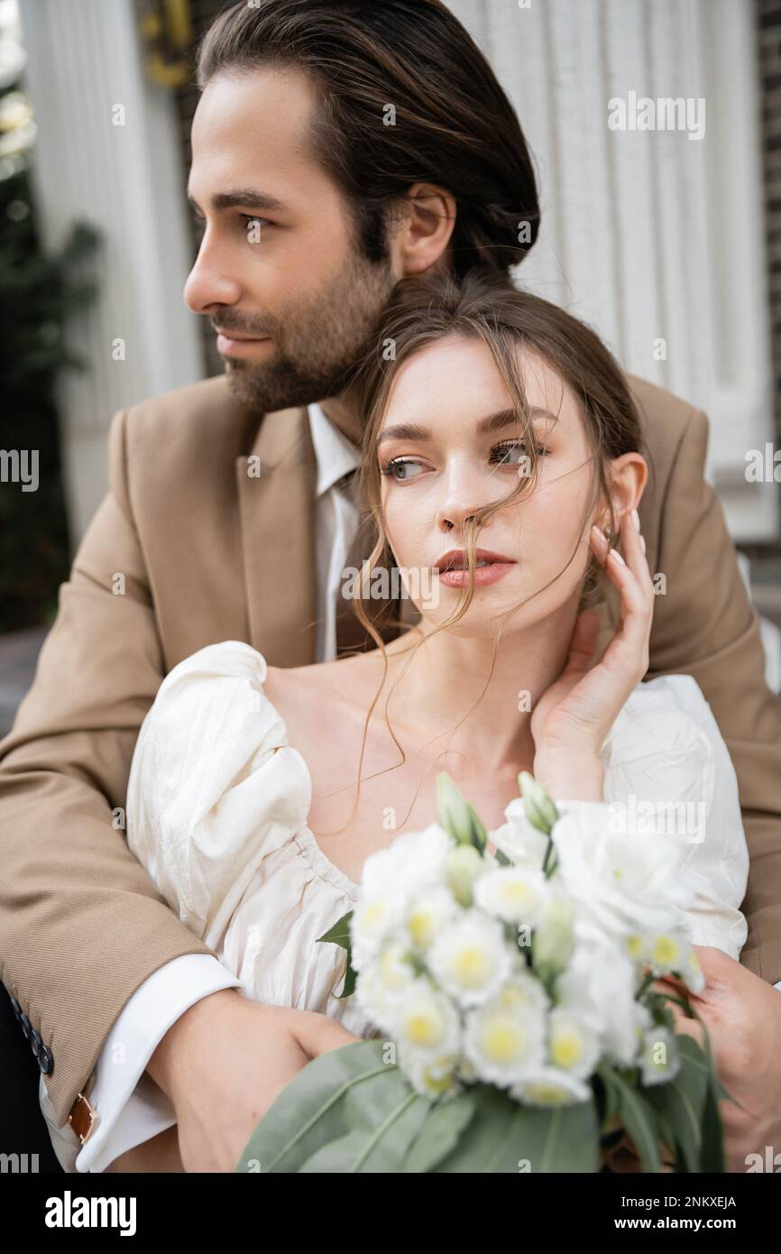 Bearded groom hugging young hi-res stock photography and images - Alamy