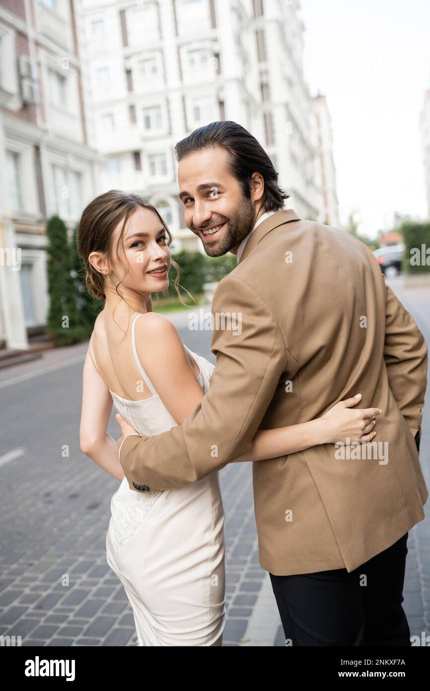 Bearded groom hugging young hi-res stock photography and images - Alamy