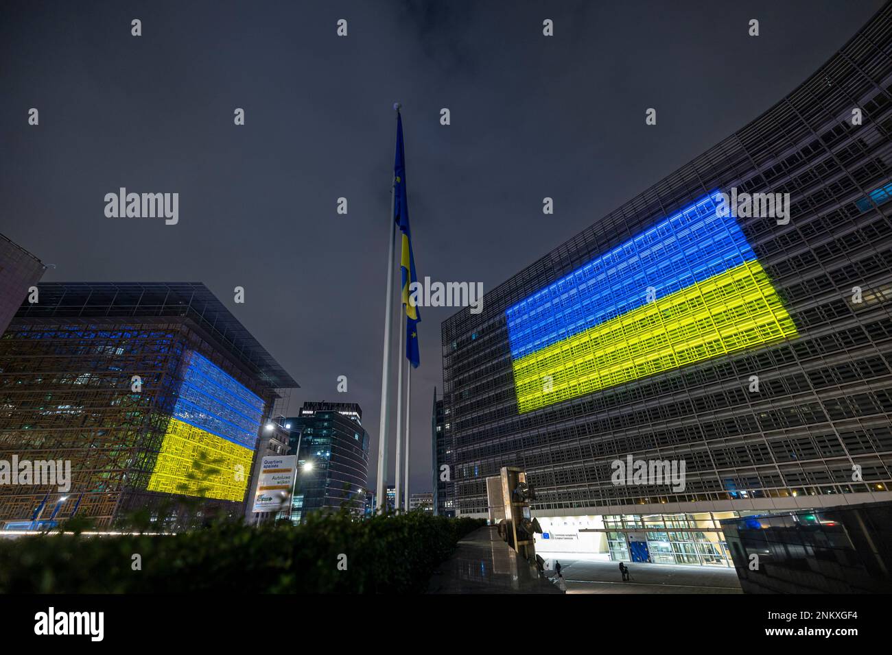 BRUSSELS, Belgium - February 23, 2023: seat of the European Council and European Commission with the Ukrainian flag projected on the facades Stock Photo