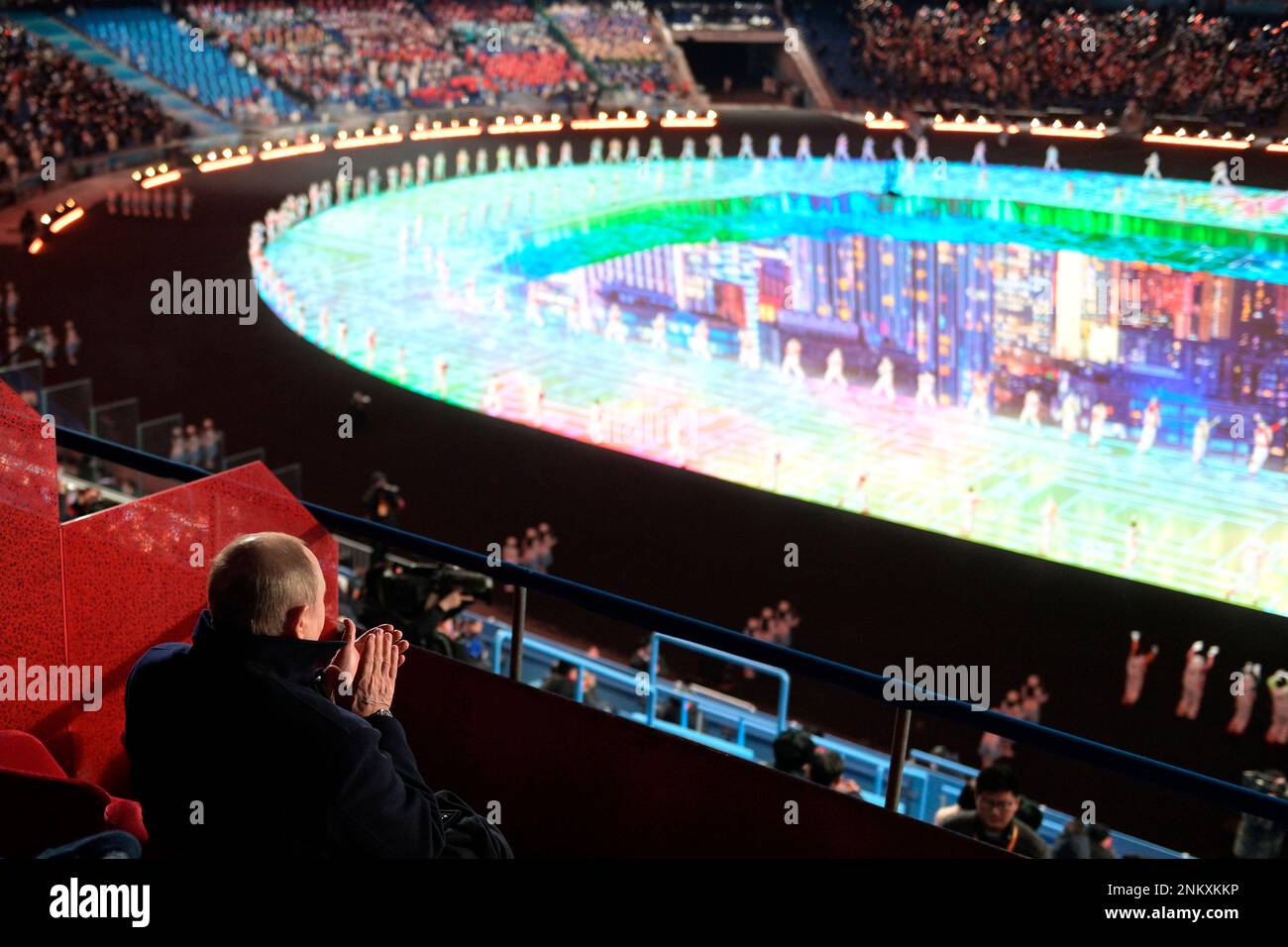 Russian President Vladimir Putin, left, applauds during the opening ...