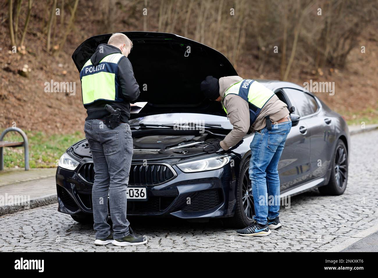 Waidhaus, Germany. 24th Feb, 2023. Control of a car entering Germany by the Bavarian border