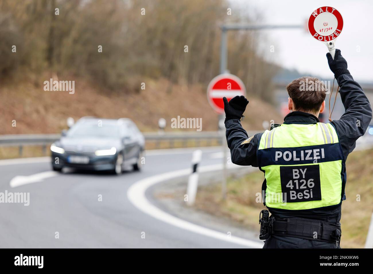 Waidhaus, Germany. 24th Feb, 2023. Control of persons and cars entering