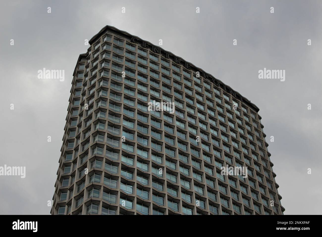 Low angle view of Centre Point Skyscraper in Central London on a typical overcast London Day. Grade II listed building, Modernist Architectural style Stock Photo