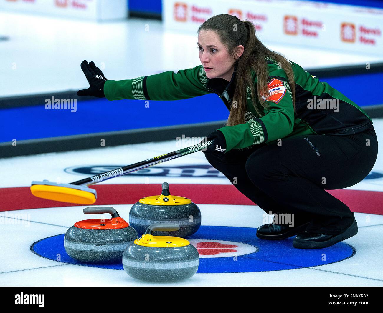 Saskatchewan skip Penny Barker directs her sweepers as they play against Wild Card 3 at the Scotties Tournament of Hearts curling event in Thunder Bay, Ontario, Thursday, Feb