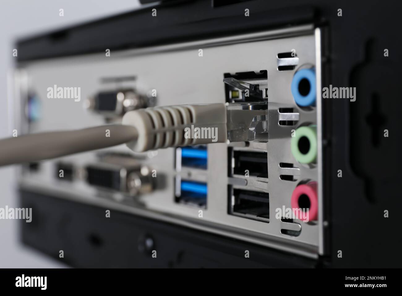 Connected cable to computer system unit, closeup.