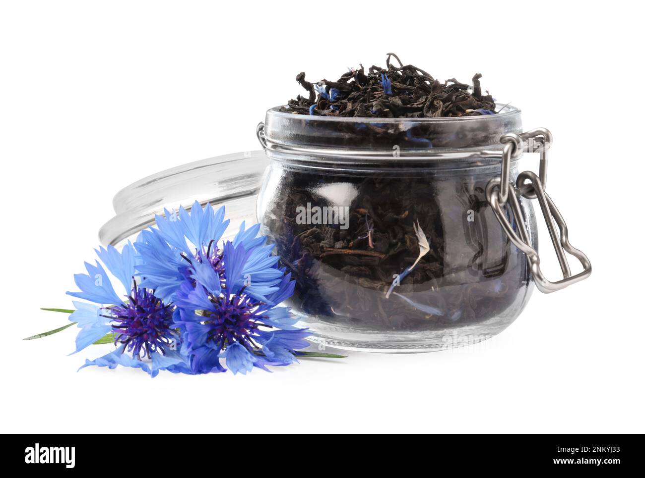 Dried cornflower tea and fresh flowers on white background Stock Photo