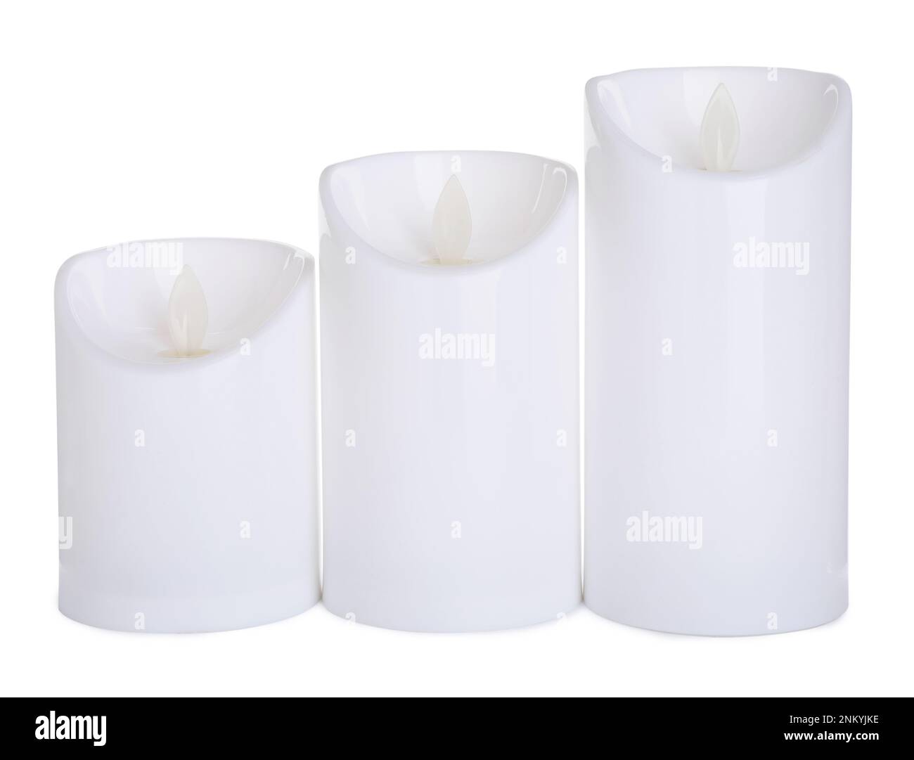 Decorative flameless LED candles on white background Stock Photo Alamy
