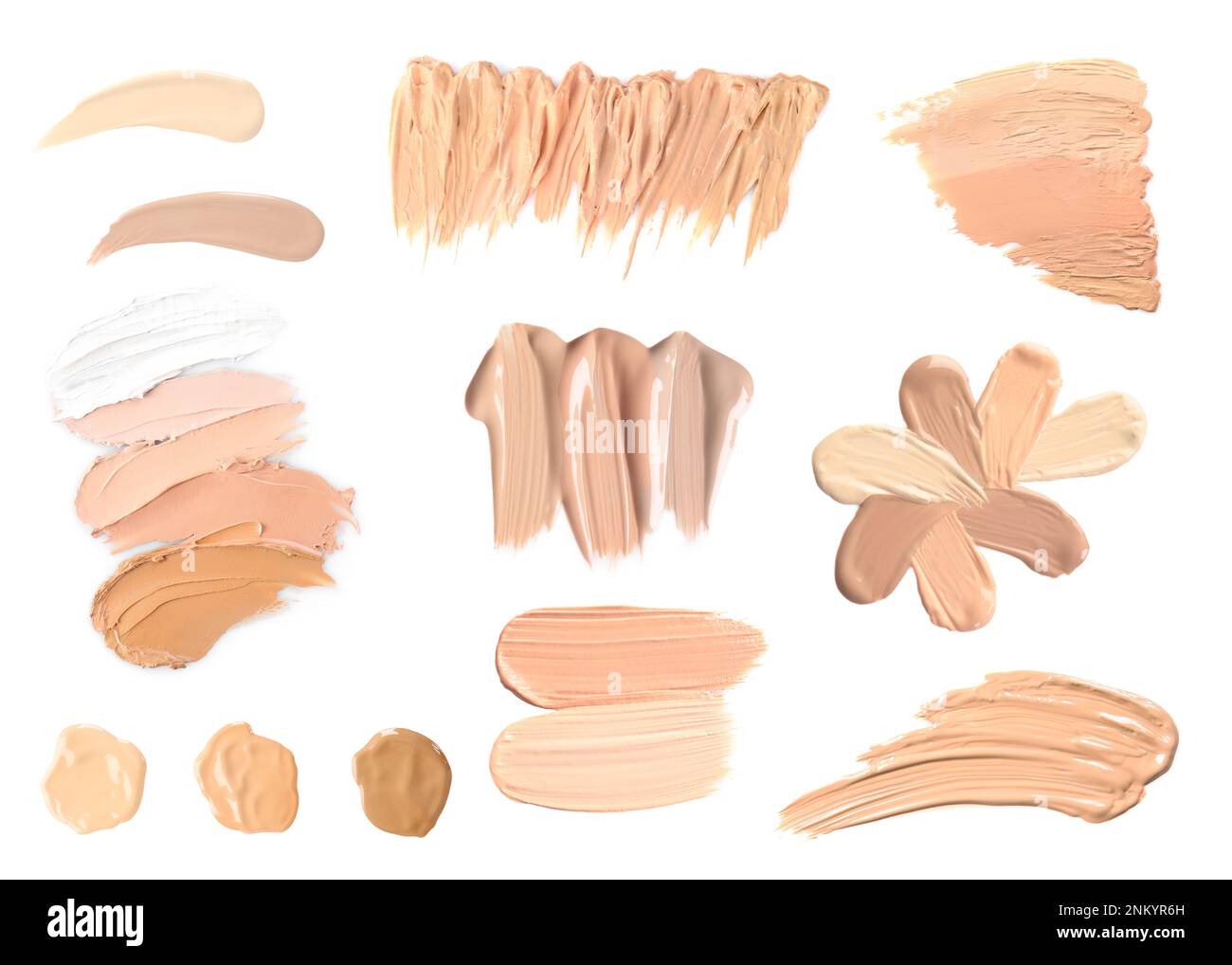 Set with different liquid foundation on white background Stock Photo