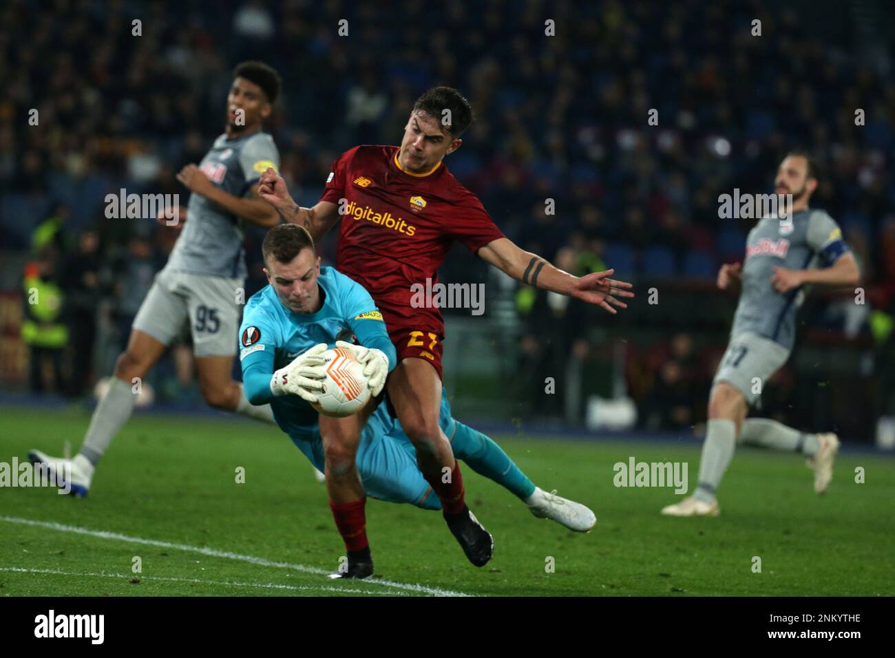 Rome, Italy. 23rd Feb, 2023. Philipp Kohn (Salzburg) catch the ball on Paulo Dybala (Roma) during the UEFA Europa League knockout round play-off leg two match between AS Roma and RB Salzburg at Stadio Olimpico on February 23, 2023 in Rome, Italy. (Photo by Giuseppe Fama/Pacific Press) Credit: Pacific Press Media Production Corp./Alamy Live News Stock Photo