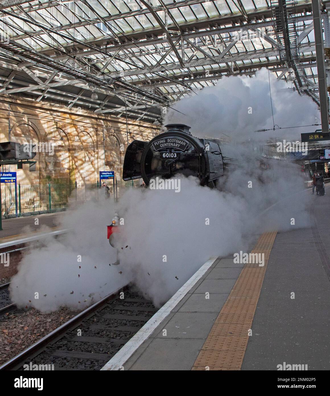 Edinburgh, Scotland, UK. 24 February 2023. The Flying Scotsman Centenary steam engine leaves Edinburgh Waverley after a reception for invited guests, celebrating 100 years of the golden age of British ingenuity, invention and craftmanship. Credit: Archwhite/alamy live news. Stock Photo