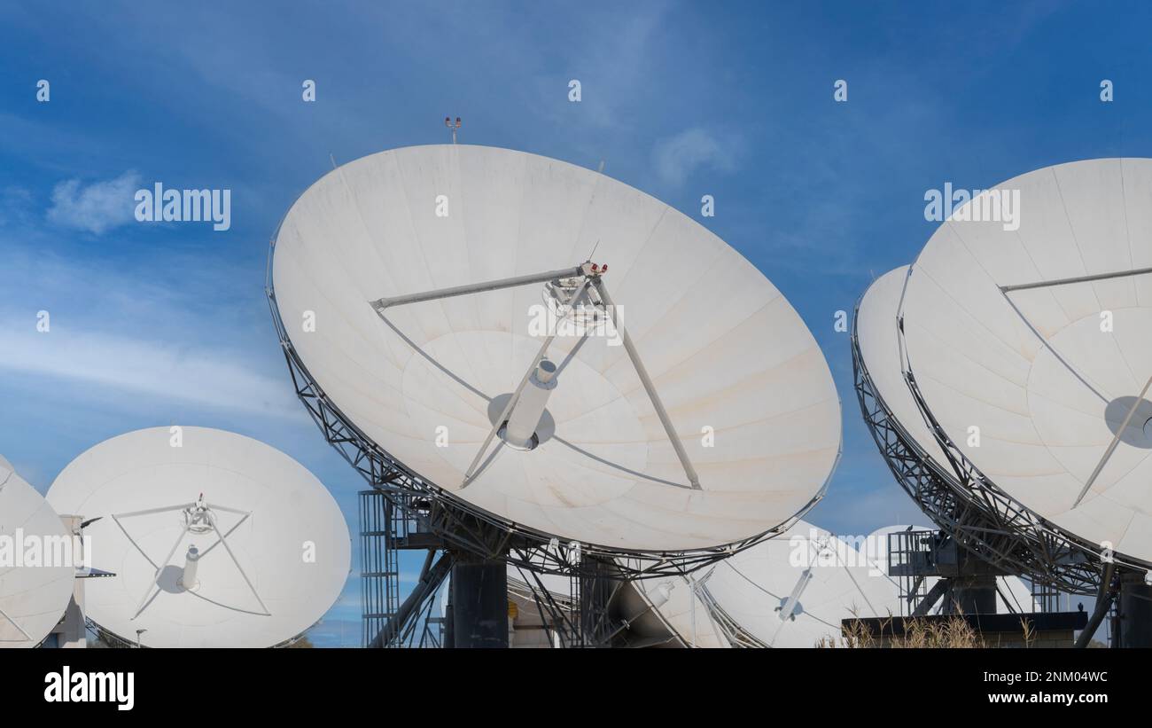 Satellite dish In the ground signal review station Stock Photo Alamy