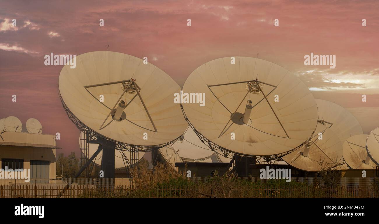 Satellite dish In the ground signal review station Stock Photo Alamy