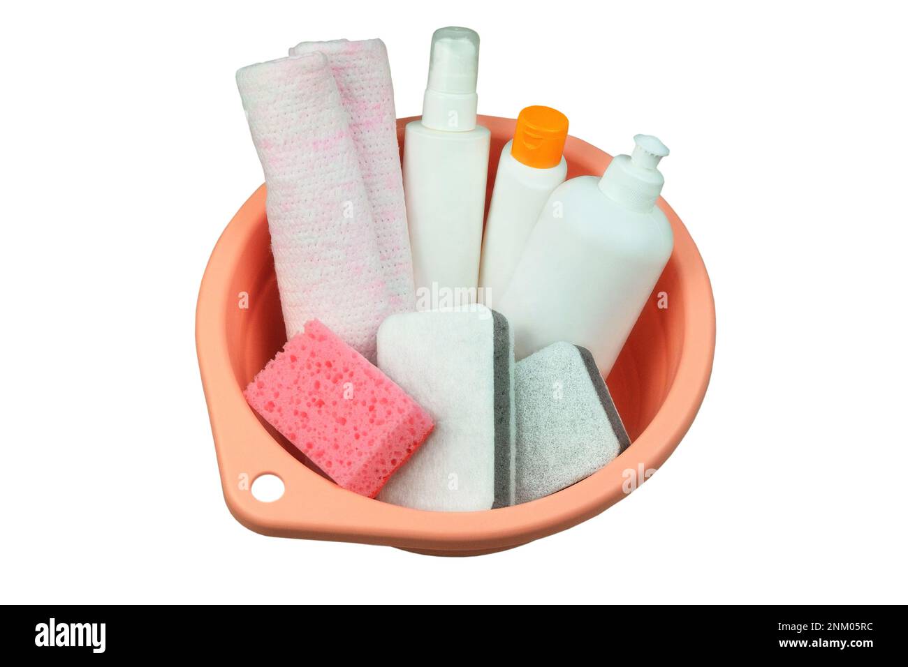 Housecleaning products. Detergent bottles with washcloths in a pink basin. Isolate on a white background. Top view. Stock Photo